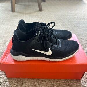 Nike Free RN Black and White Athletic Sneakers